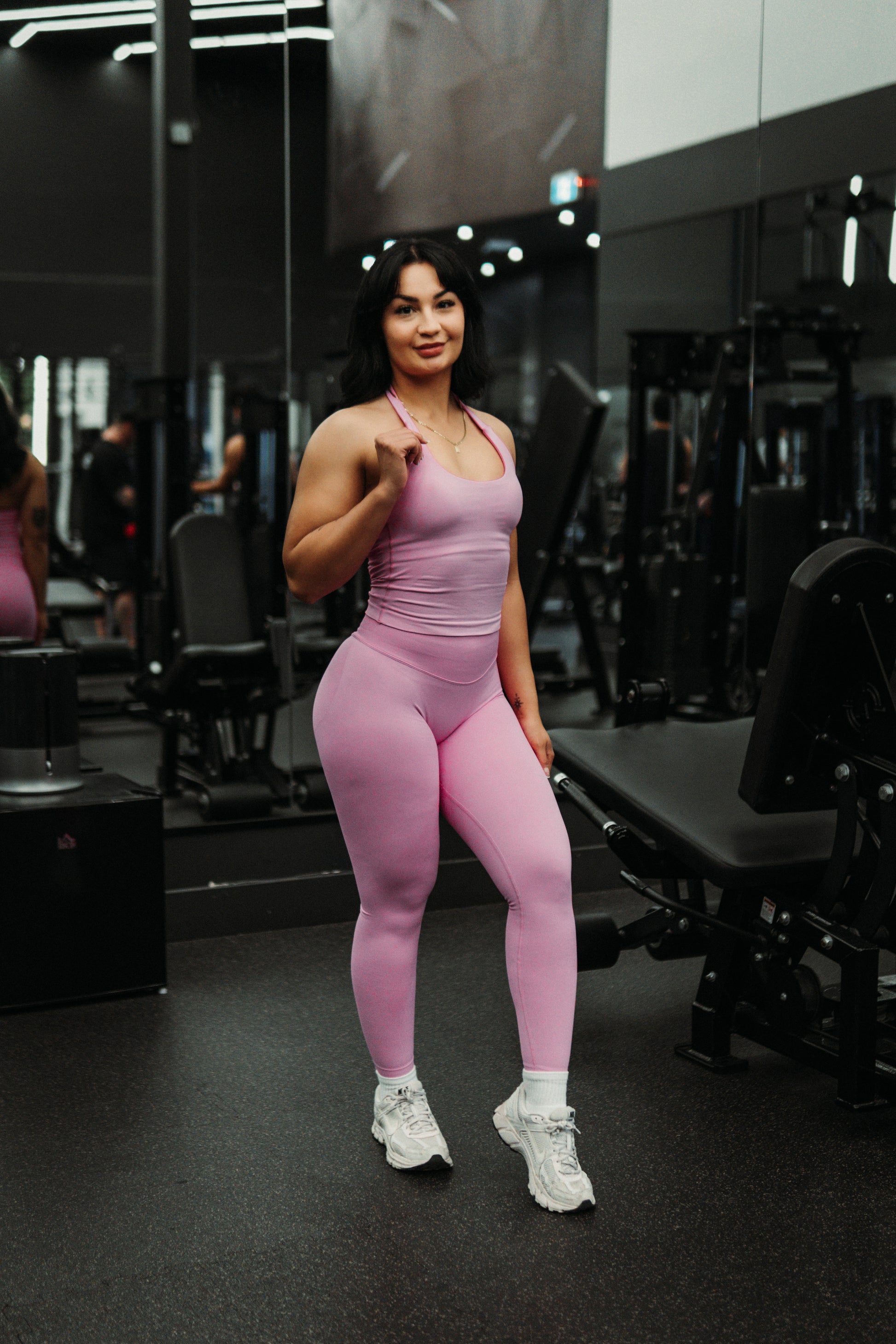 Pink athletic halter top for gym, fitness, and activewear outfits.